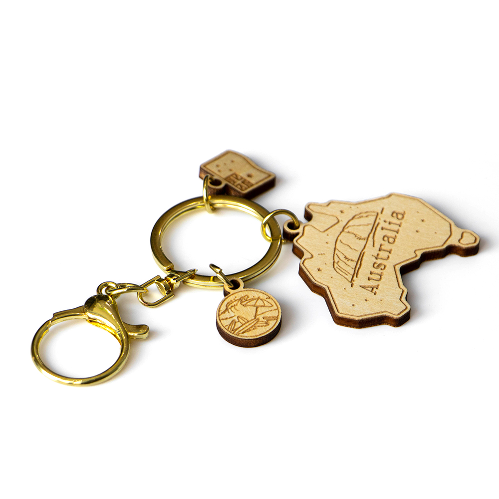 australia keychain, australia map souvenir, wooden keyring, laser cut keychain, custom australia gift, wood souvenir keychain, wholesale souvenir supplier, australian gift keychain, eco friendly keyring, travel souvenir australia