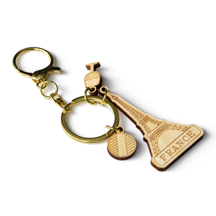 france keychain, eiffel tower souvenir, wooden keyring, paris travel gift, french tourist keychain, custom wooden souvenir, laser cut keychain, wholesale gift supplier, france b2b souvenir, eco wood keychain