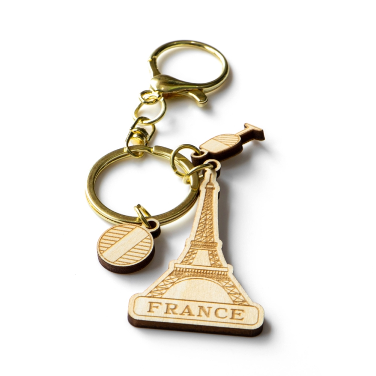 france keychain, eiffel tower souvenir, wooden keyring, paris travel gift, french tourist keychain, custom wooden souvenir, laser cut keychain, wholesale gift supplier, france b2b souvenir, eco wood keychain